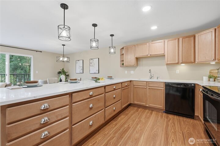 Property Photo:  700  Front Street S E206  WA 98027 