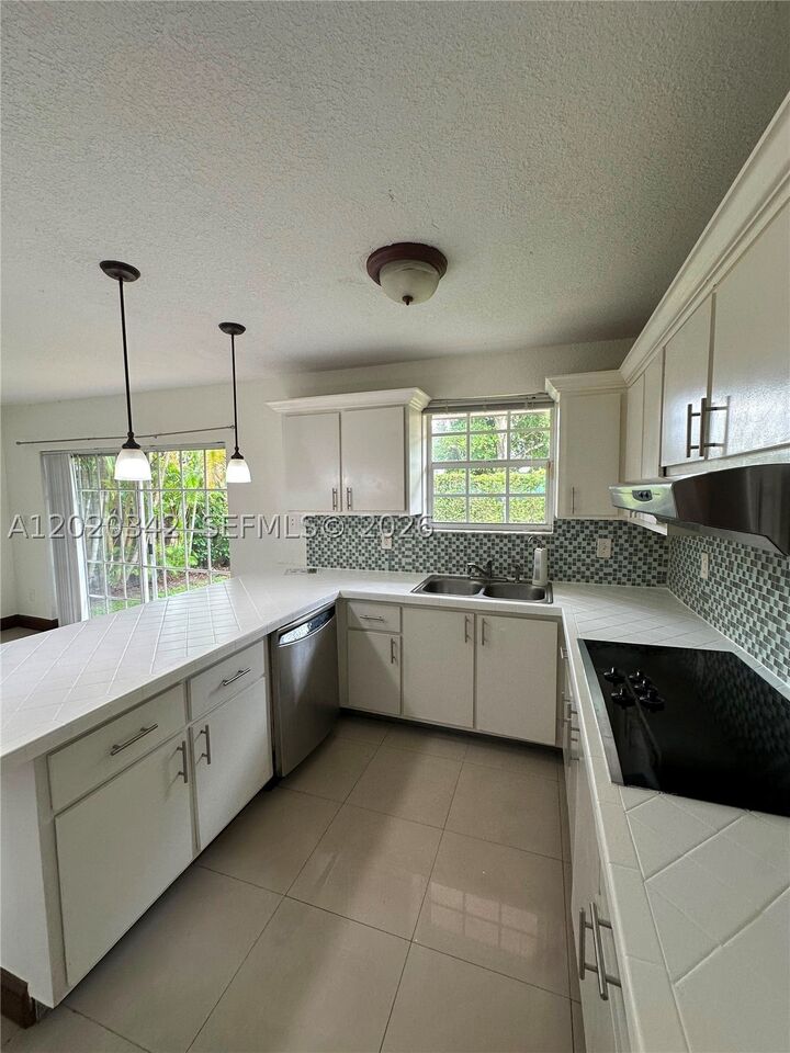 Property Photo:  10120 SW 127th Ave  FL 33186 