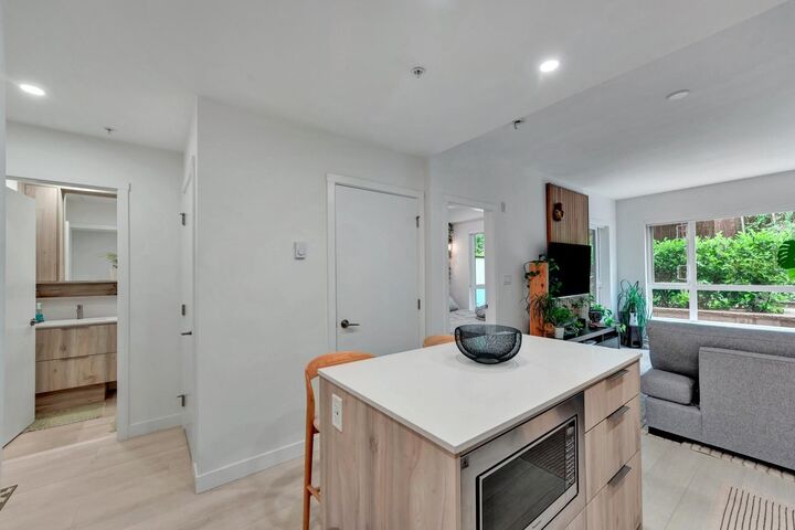 Property Photo: 3596 Malsum Drive 211 BC V7G 0B5