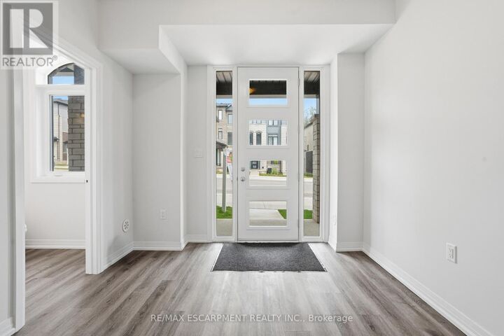 Property Photo:  155 Equestrian Way Unit 33  ON N3E 0E8 
