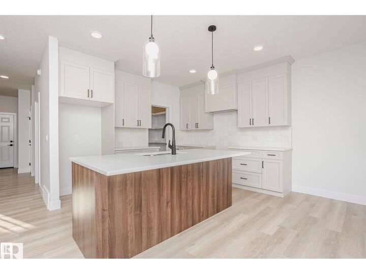 Property Photo:  6302 Dansereau Crescent  AB T4X 3E1 