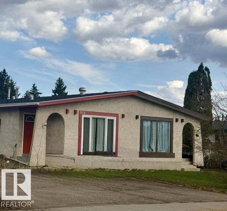 Property Photo:  202 22 Street  AB T9M 1E8 