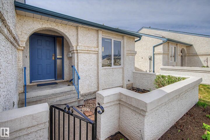 Property Photo: 9718 176 Street NW 12 AB T6L 1W3