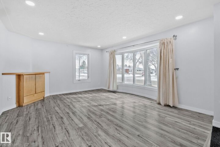 Property Photo:  12002 37 Street NW  AB T5W 2C3 