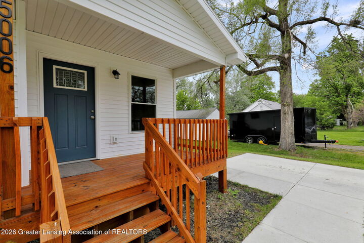 Property Photo:  5006 Christiansen Road  MI 48910 