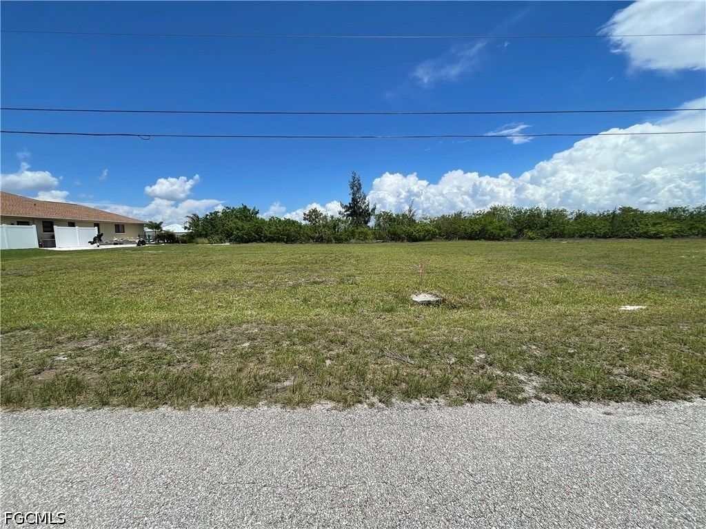 Property Photo:  825 NW 33rd Place  FL 33993 