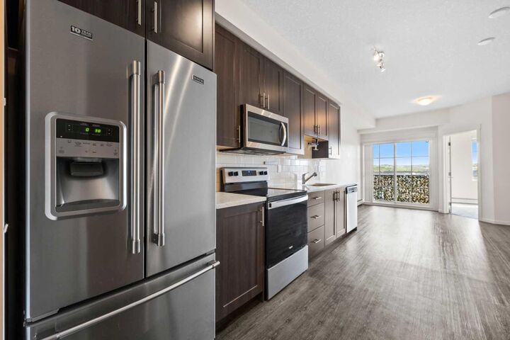 Property Photo:  151 Legacy Main Street SE 6405  AB T2X 4A4 