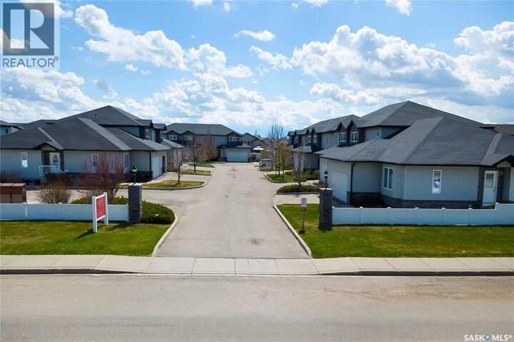 Property Photo:  2 547 East Hampton Boulevard  SK S7R 0B1 