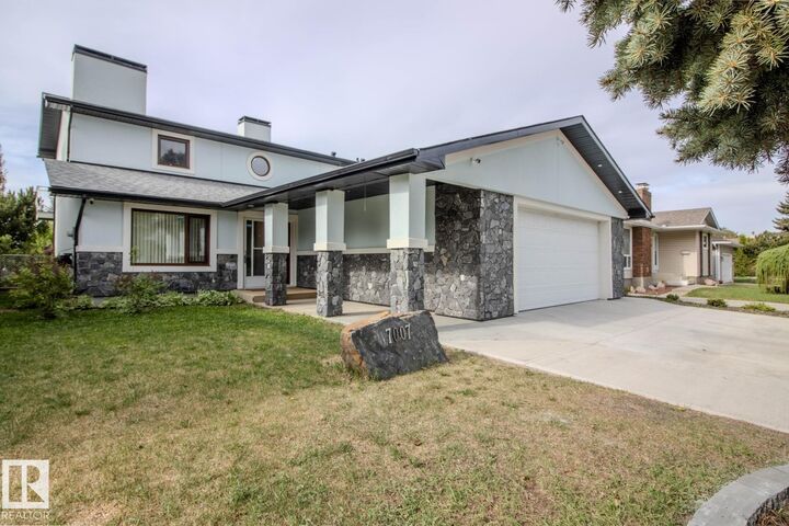 Property Photo:  7007 10 Avenue NW  AB T6K 2T9 
