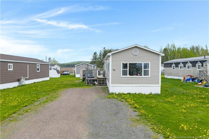 Property Photo: 58 Orchard Crescent NB E4E 3X7