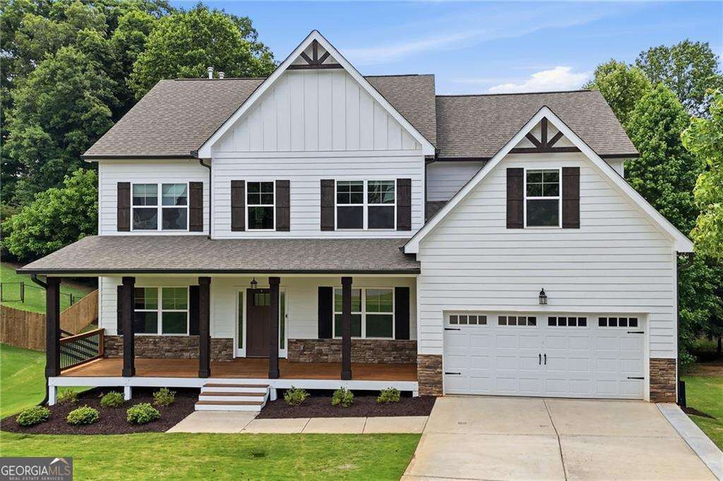 Property Photo:  7285 Hedgerose Drive  GA 30028 