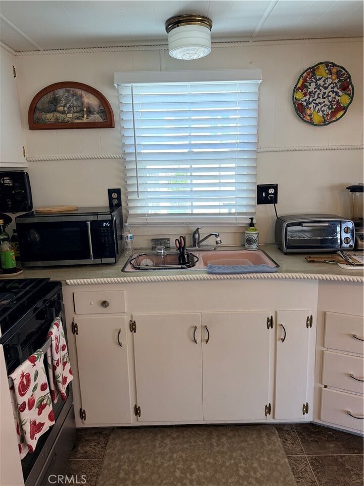 Property Photo:  12177 3rd St 57  CA 92399 