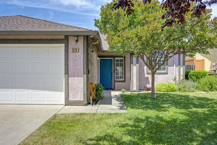 Property Photo:  1578 E J  CA 95361 