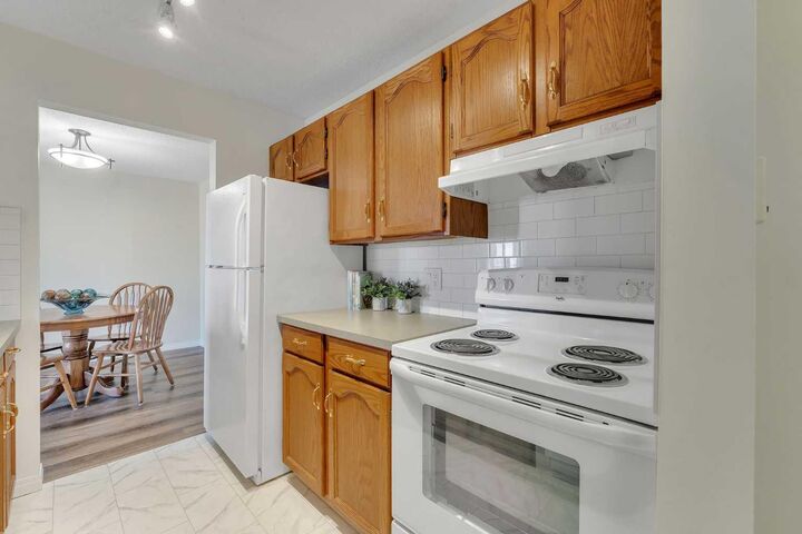 Property Photo:  309 Woodside Drive NW 210  AB T4B 2E7 