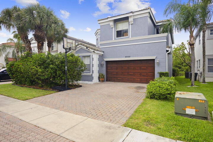 Property Photo:  9049 Dupont Place  FL 33414 