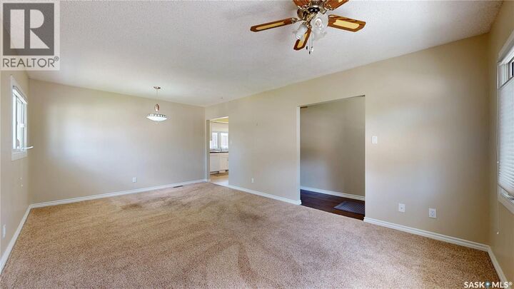 Property Photo:  5445 4th Avenue  SK S4T 0J8 