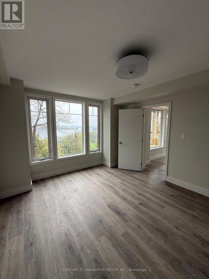 Property Photo: 3 Tree Tops Lane 101 ON P1H 1A9
