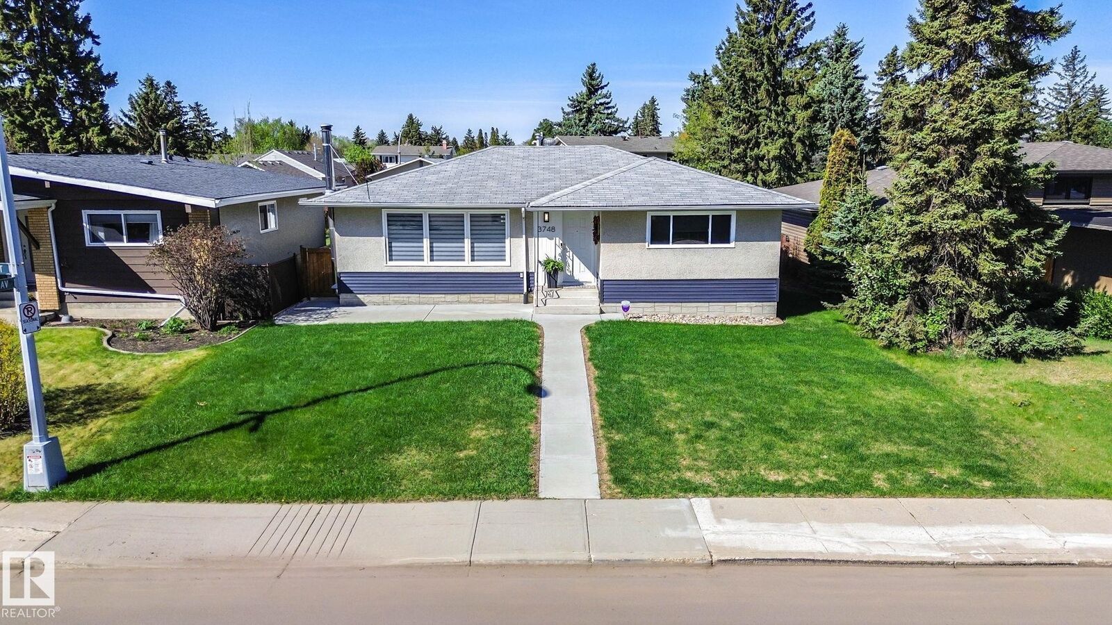 Property Photo: 3748 117 Street NW AB T6J 1S7