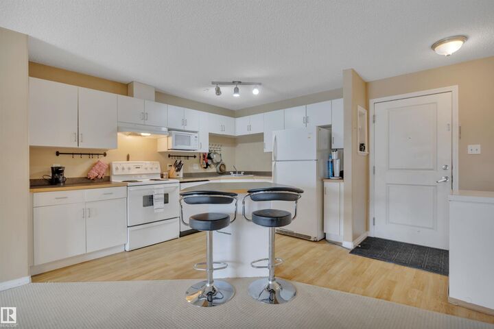 Property Photo:  11325 83 Street NW 326  AB T5B 4W5 