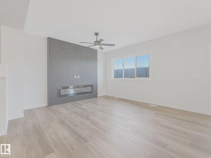 Property Photo:  20723 24 Avenue NW  AB T6M 2C4 