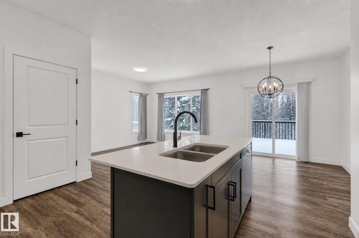 Property Photo:  5122 213A Street NW 53  AB T6M 1M6 