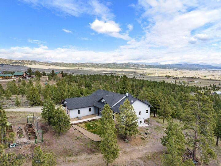 Property Photo:  8235 Evergreen Drive  MT 59602 