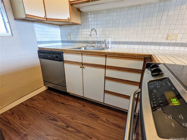 Property Photo:  46-270 Kahuhipa Street A410  HI 96744 