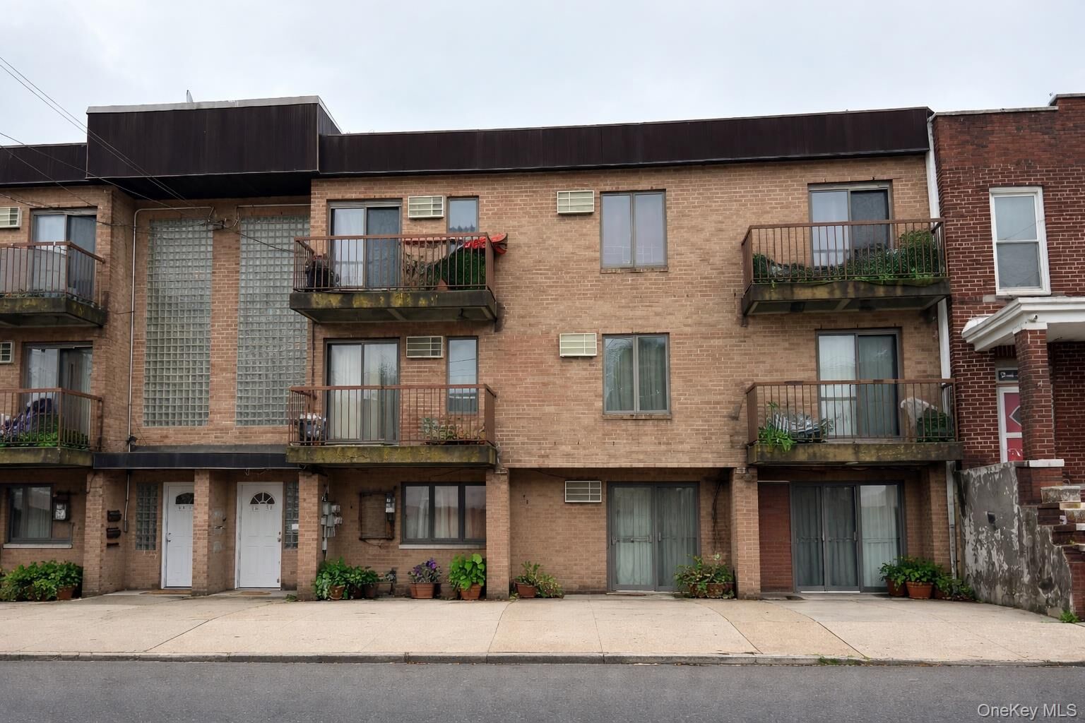 Property Photo:  76-14 69th Road  NY 11379 