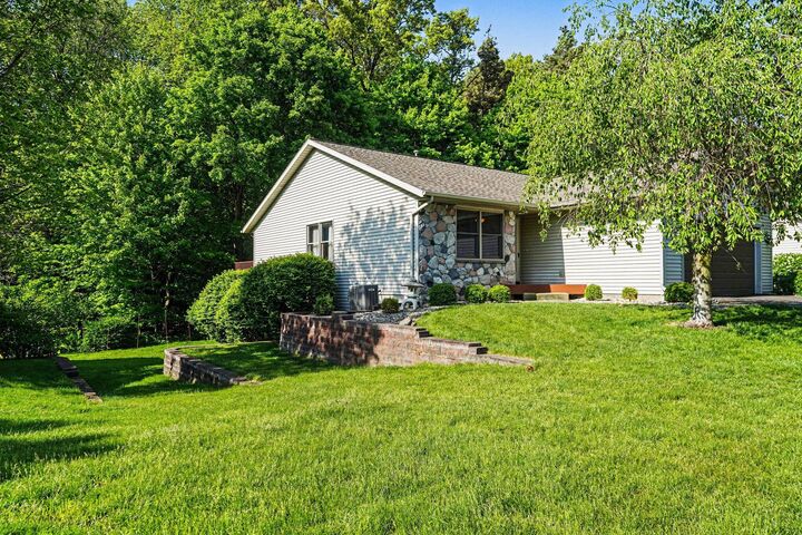 Property Photo:  6811 Birdsong Avenue  MI 49009 