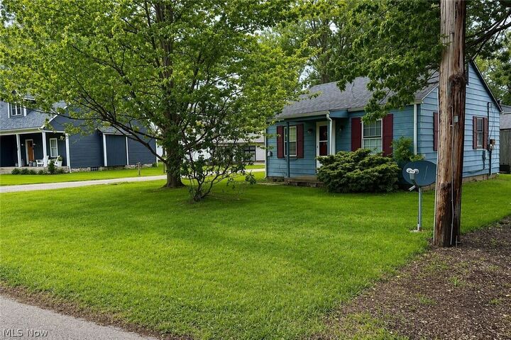 Property Photo:  6359 Lake Rd West  OH 44004 