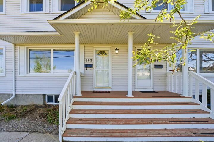 Property Photo:  583 Killarney Glen Court SW  AB T3E 7H4 