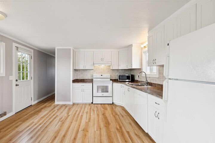 Property Photo:  418 Kanel Drive NE  AB T1V 1J6 