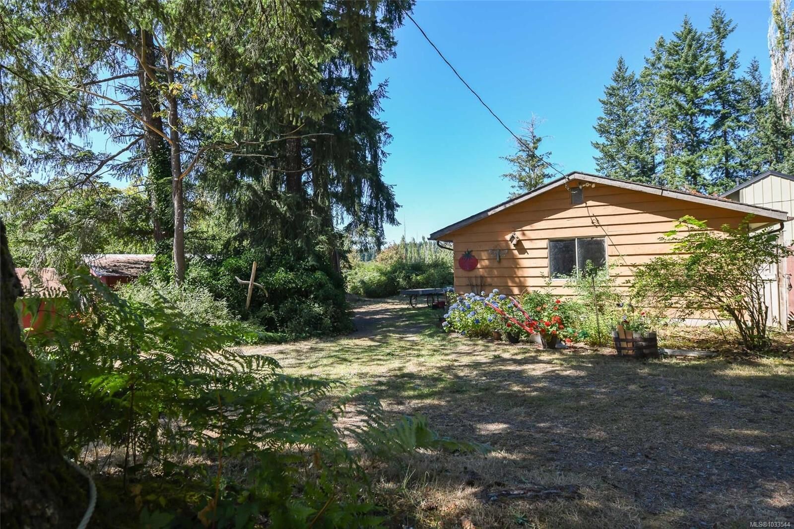 Property Photo: 5835 Island Hwy N BC V9J 1T3