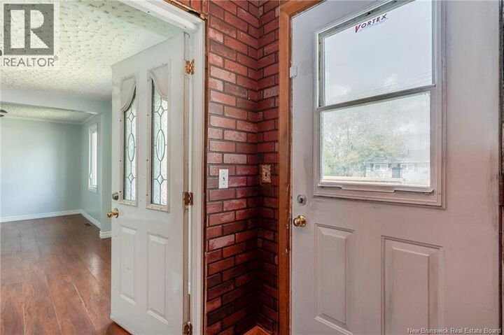 Property Photo:  150 Purdy Avenue  NB E1C 7W2 