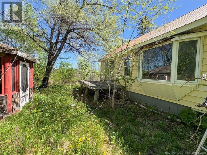 Property Photo:  284 Main Street  NB E6H 1E5 