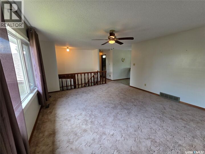 Property Photo:  613 2nd Street W  SK S9X 1E6 