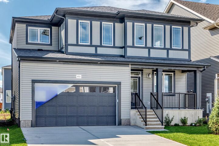 Property Photo: 1512 205 Street NW AB T6M 3E7