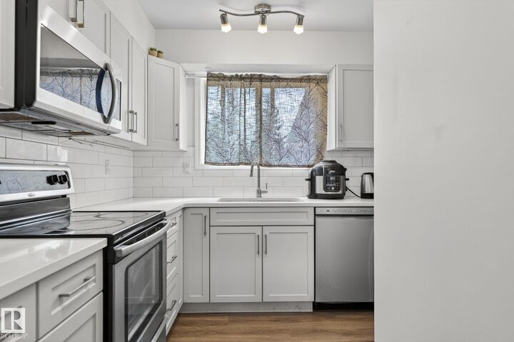 Property Photo:  7604 29 Avenue NW 53  AB T6K 3Z2 