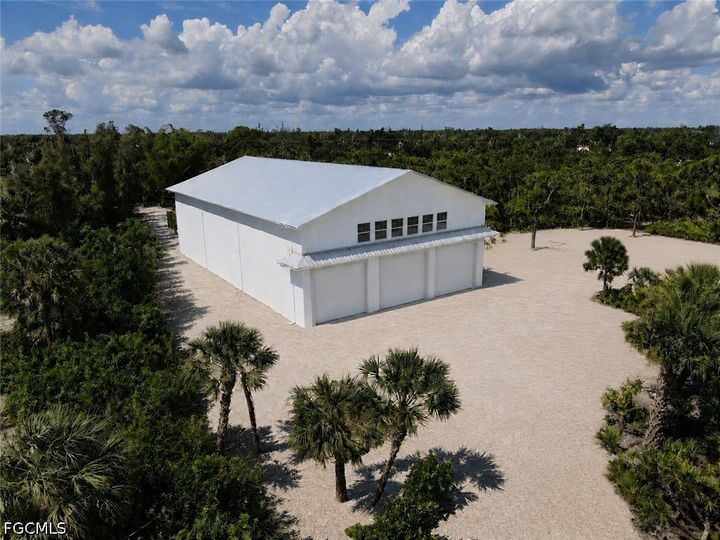 Property Photo:  6690 Pineland Road  FL 33922 