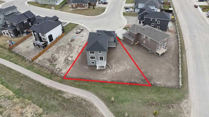 Property Photo: 65 Lakes Estates Circle AB T1P 0B6