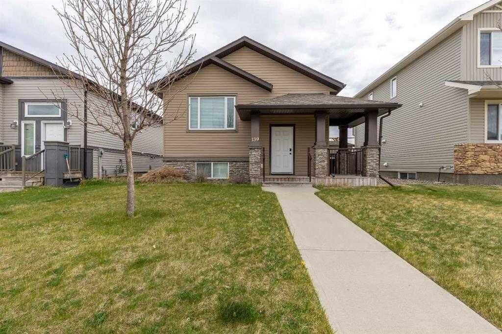 Property Photo:  139 Mt Sundial Court W Main Floor  AB T1J 5B7 