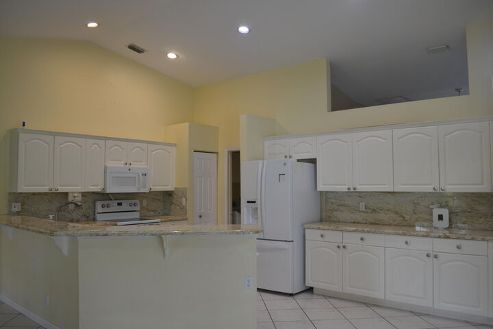 Property Photo:  1104 Raintree Lane  FL 33414 