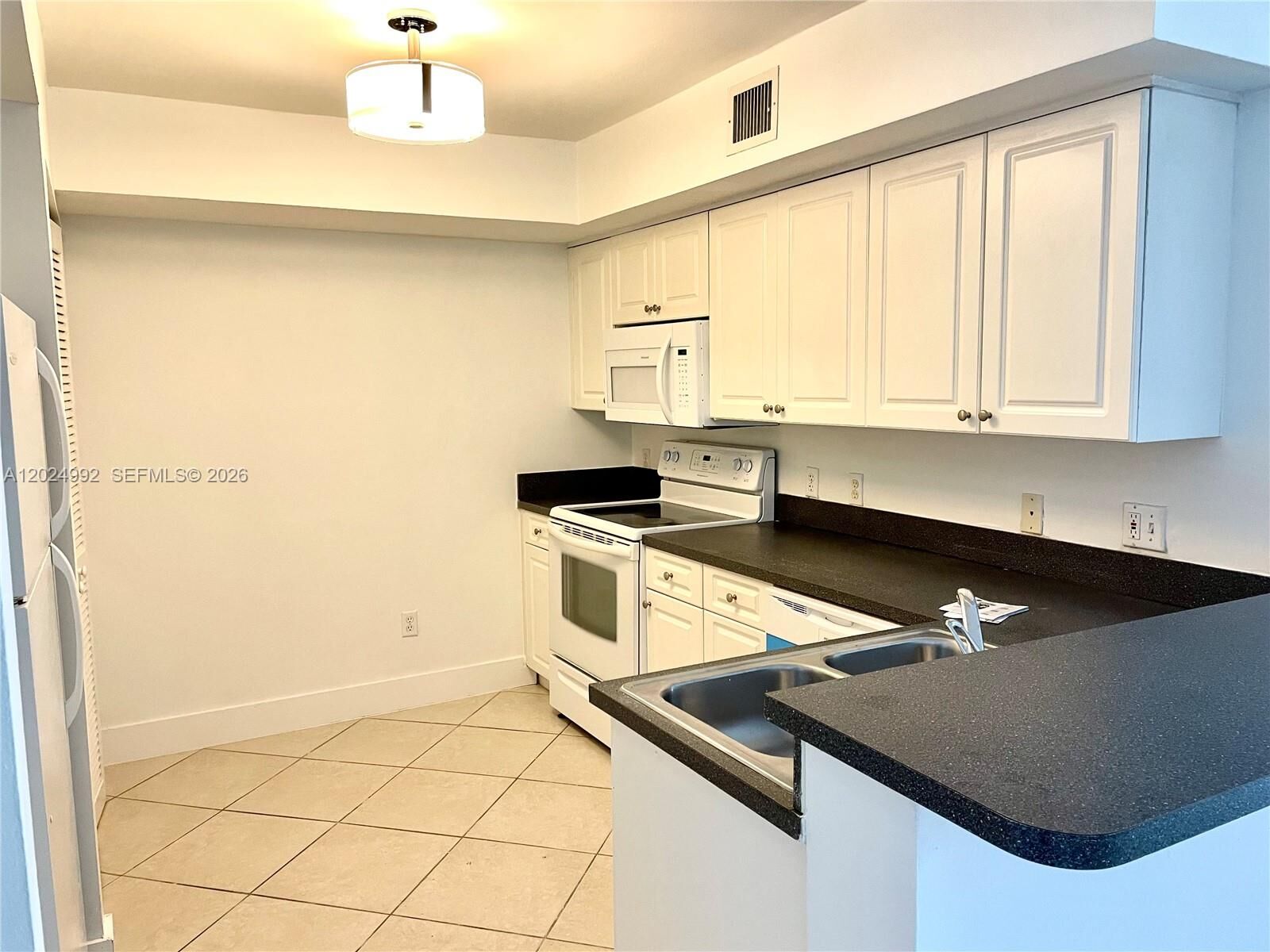 Property Photo: 150 NW 96th Ave 9-207 FL 33024