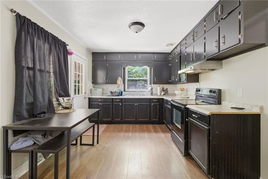 Property Photo:  1608 E Cone Boulevard  NC 27405 