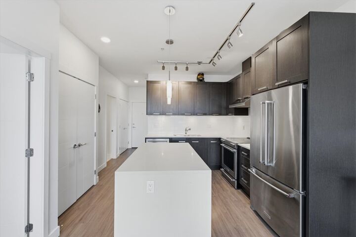 Property Photo: 5638 201A Street 511 BC V3A 0L8