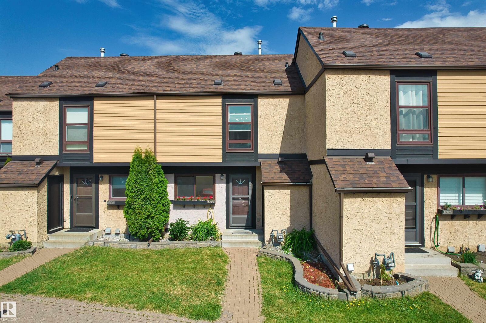 Property Photo: 12128 25 Avenue NW AB T6J 4L4