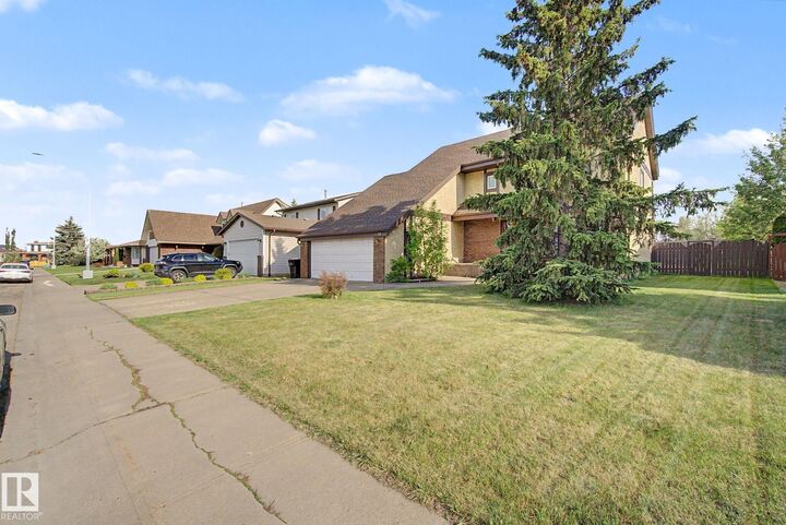 Property Photo: 11127 23A Avenue NW AB T6J 4W5