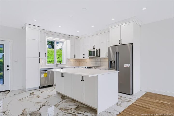 Property Photo:  16 Mayflower Street  NB E3C 1L5 