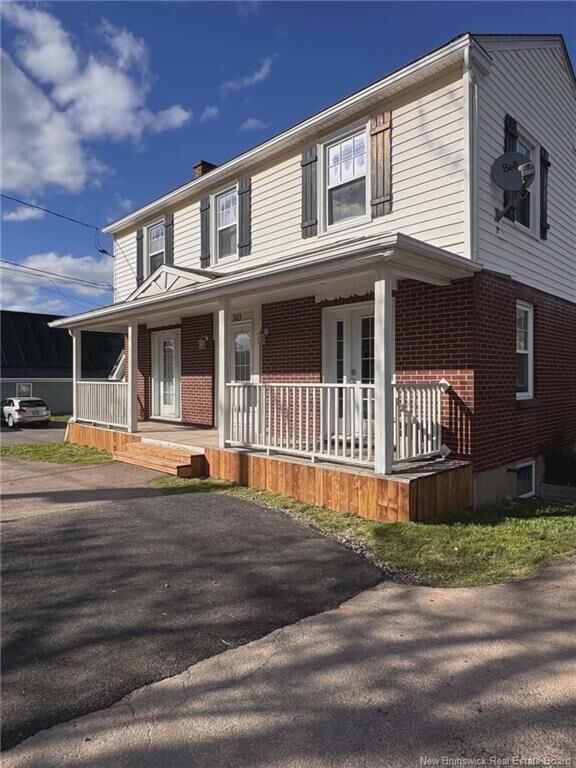 Property Photo: 303 McLaughlin Drive NB E1A 4R1