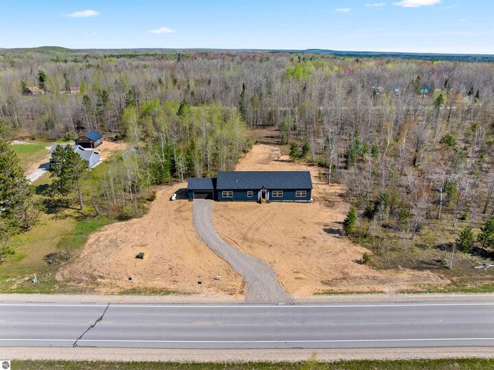 Property Photo: 11159 Mancelona Road MI 49659